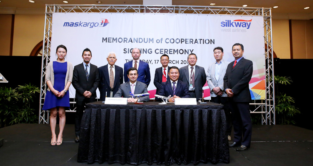 (front l-r) Kamran Gasimov, CEO of Silk Way West Airlines and Ahmad Luqman Mohd Azmi, CEO of MASkargo with the management teams of MASkargo and Silk Way West Airlines behind. 
