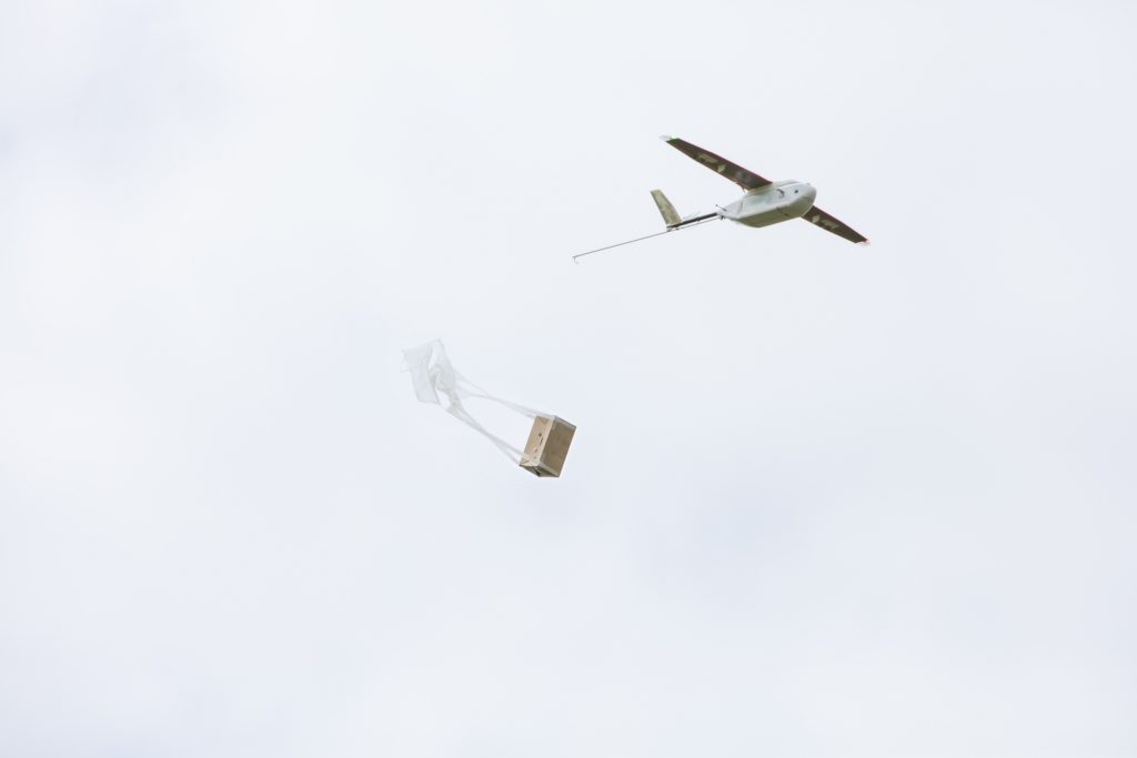 The Zipline drone dropping the parcel at the destination during a simulation